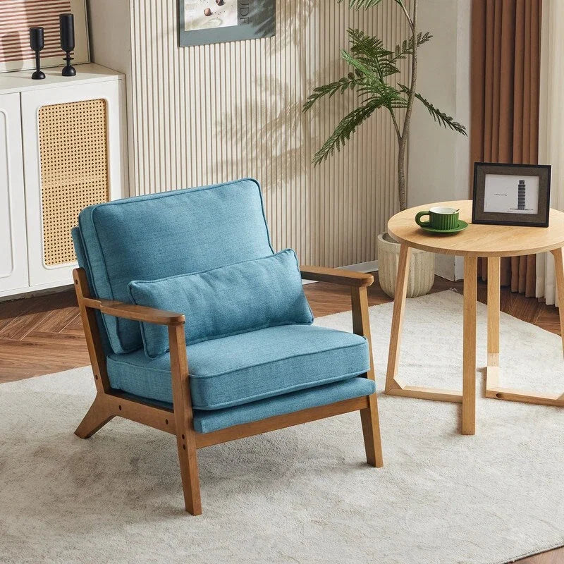 Poltrona d'accento rivestita in misto lino con gambe in legno e un cuscino, beige