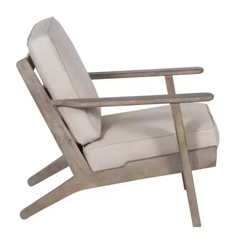 Poltroncina artigianale in legno di mango con sedile imbottito e gambe oblique