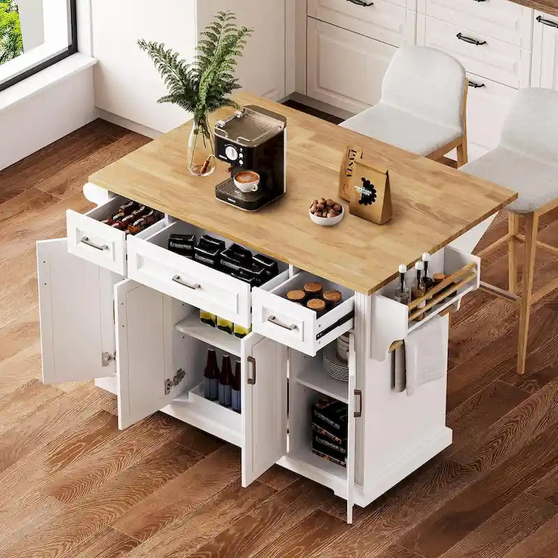 54 - Grande isola cucina con anta a ribalta in legno di gomma, carrello da cucina scorrevole con texture in rilievo su 4 ruote con 4 ante e 3 cassetti