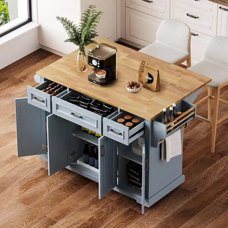 54 - Grande isola cucina con anta a ribalta in legno di gomma, carrello da cucina scorrevole con texture in rilievo su 4 ruote con 4 ante e 3 cassetti