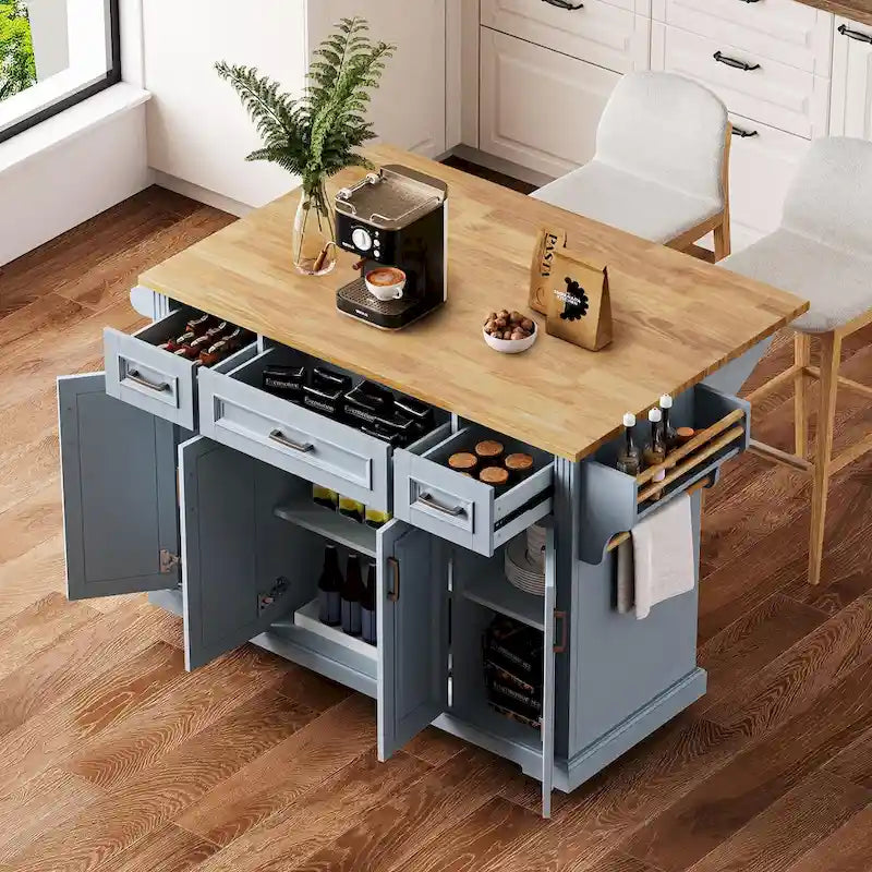 54 - Grande isola cucina con anta a ribalta in legno di gomma, carrello da cucina scorrevole con texture in rilievo su 4 ruote con 4 ante e 3 cassetti